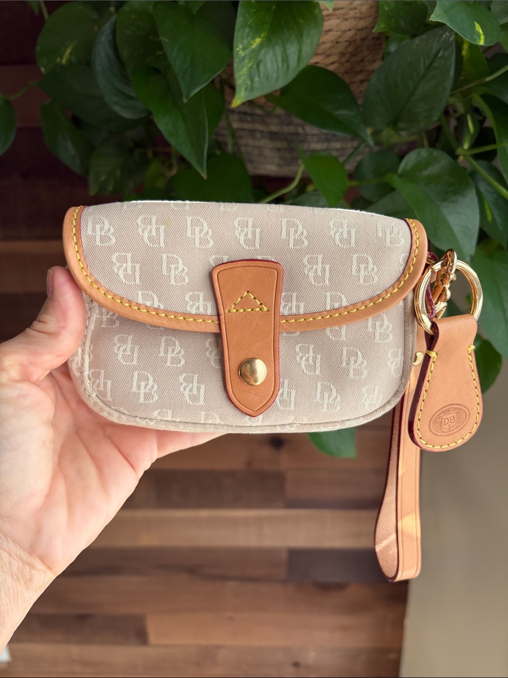 Dooney & Bourke Beige Signature Wristlet with Tan Trim and Red-Edged Strap